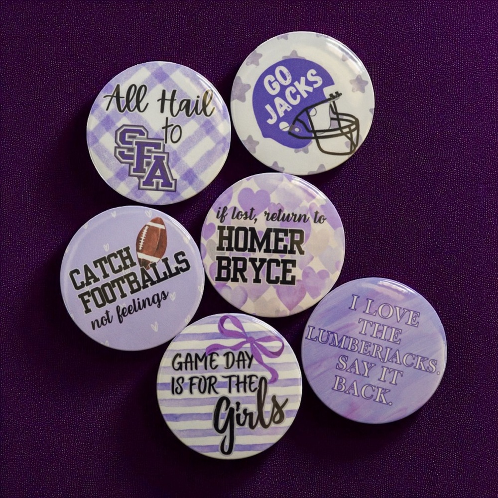 Purple SFA Lumberjack game day buttons